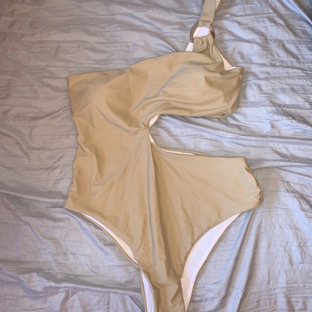 Brand new nude cut out swim suit